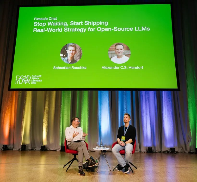 Stage setup for the fireside chat "Stop Waiting, Start Shipping — Real-World Strategy for Open-Source LLMs" with Sebastian Raschka and Alexander C. S. Hendorf, PyCon DE & PyData 2026